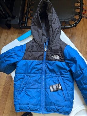 The North Face Kids Blue and black Hooded Puffer Jacket